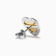 The Canare 18K Two Tone Gold White and Yellow Diamond Heart Earrings feature a yellow diamond center surrounded by white diamonds in an elegant heart design for a timeless, radiant look.