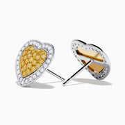 The Canare 18K Two Tone Gold White and Yellow Diamond Heart Earrings feature a yellow diamond center surrounded by white diamonds in an elegant heart design for a timeless, radiant look.