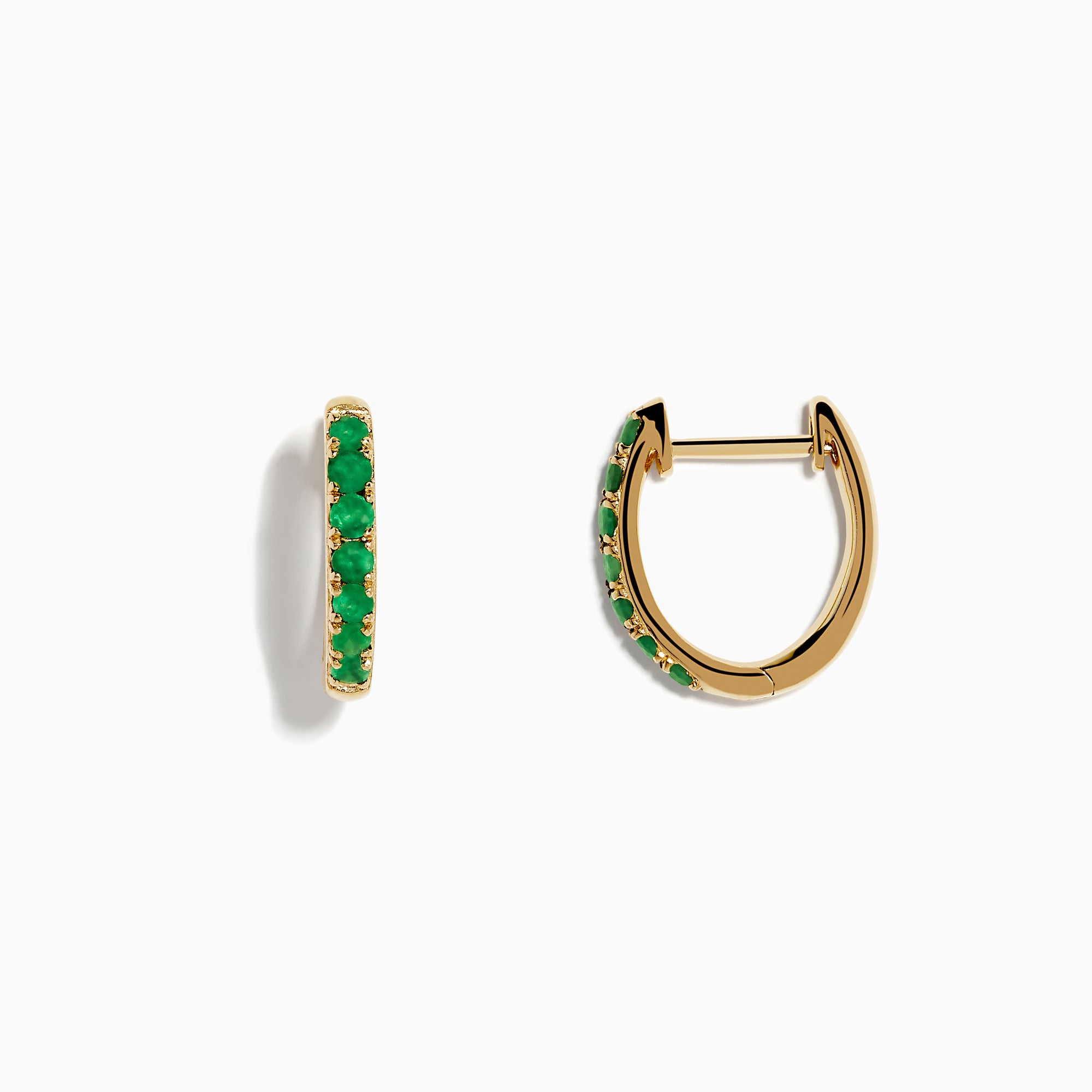 The 14K Yellow Gold Emerald Huggie Earrings feature small gold hoops set with bright green gemstones, crafted in 14K yellow gold and showcased against a white background.