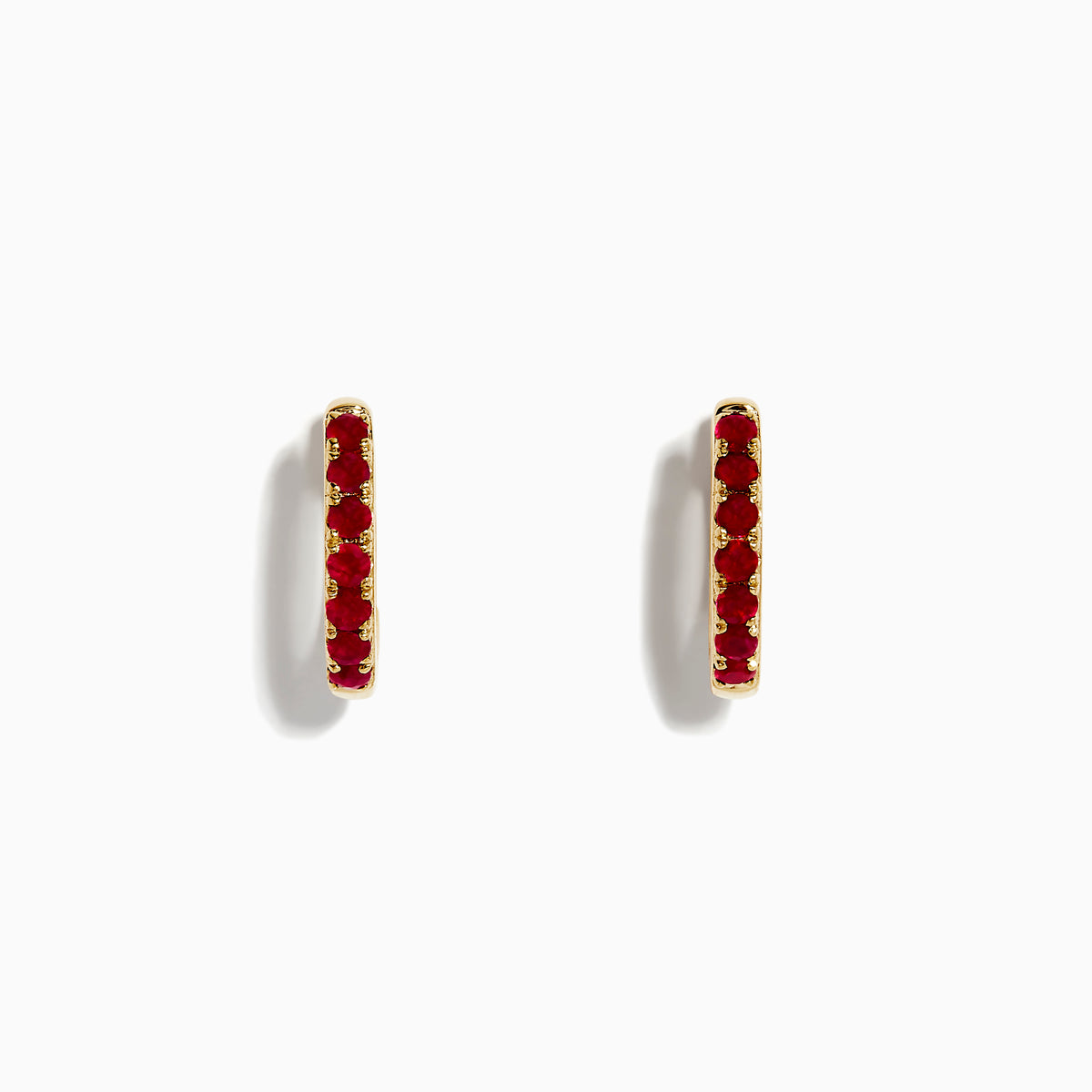 Ruby Royale 14k Yellow Gold Ruby Huggie Earrings: Small yellow gold hoops featuring a single row of red rubies, elegantly displayed against a plain white background.