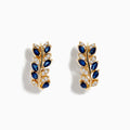 The Royale Bleu 14K Yellow Gold Blue Sapphire and Diamond Earrings feature laurel leaf shapes with alternating blue sapphires and diamonds, arranged in a delicate, natural-inspired design against a white background.