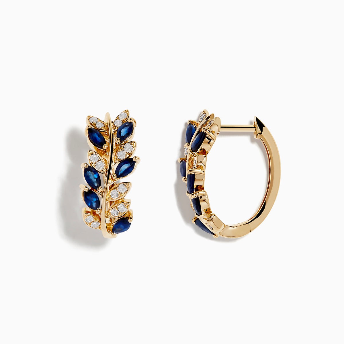 The Royale Bleu 14K Yellow Gold Earrings feature a leaf design with alternating blue sapphires and diamonds on the front. One earring is shown from the front, the other from the side, both on a white background.
