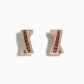 The 14K Rose Gold Espresso and White Diamond Earrings feature an hourglass design with alternating vertical rows of espresso diamonds and sparkling white stones.