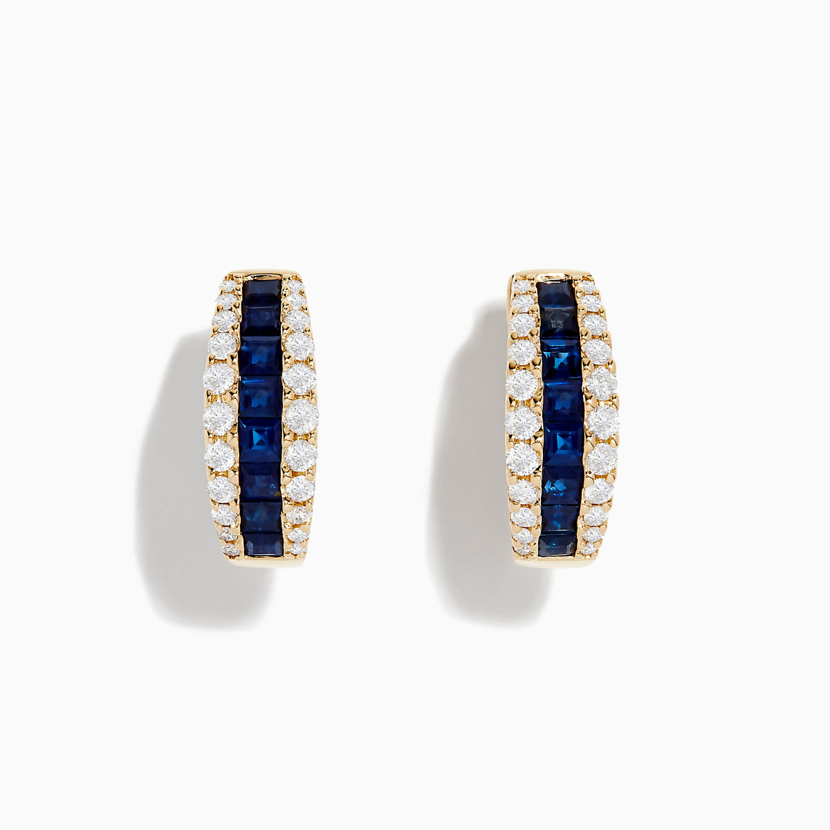 The Royale Bleu 14K Yellow Gold Blue Sapphire and Diamond Hoop Earrings feature a central row of square blue sapphires with round white diamonds on each side, displayed against a plain white background.
