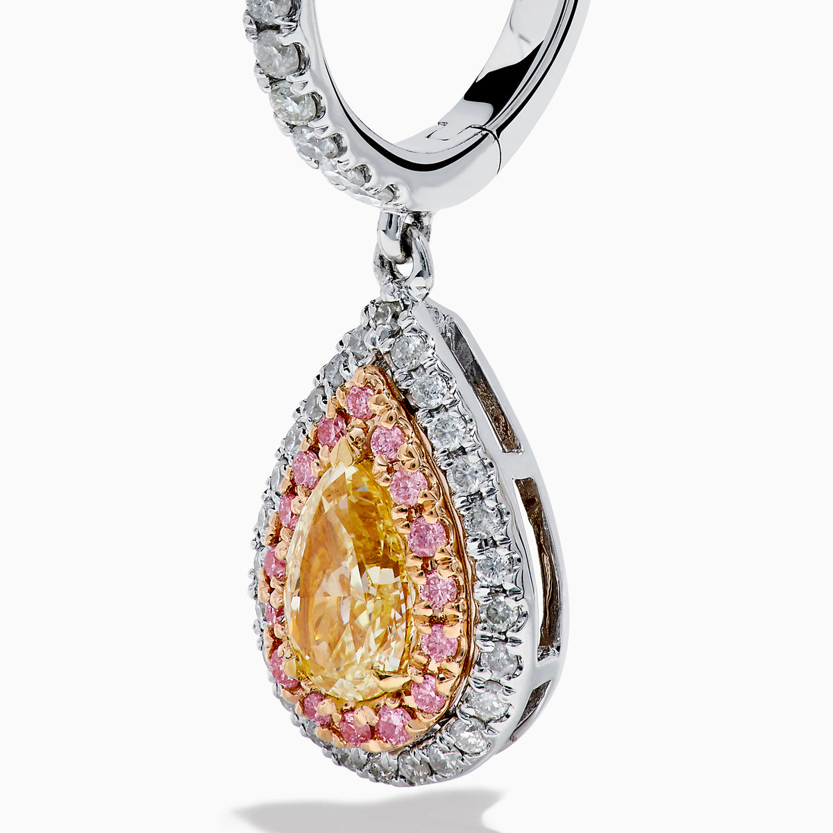 The 18K 3-Tone Gold White, Yellow and Pink Diamond Drop Halo Earrings feature teardrop-shaped yellow gemstones surrounded by pink and white diamonds in a luxurious three-tone gold setting.