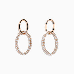 The Pave Rose 14K Rose Gold Diamond Interlock Earrings feature a small smooth oval linked to a larger diamond-encrusted oval, all elegantly crafted in 14K rose gold and displayed against a plain white background.