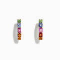 The Watercolor 14k Gold Emerald Cut Multi Sapphire Hoop Earrings feature green, blue, pink, red, and orange sapphires arranged vertically. Shown against a white background.