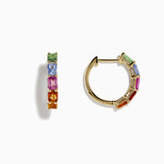 The Watercolor 14k Gold Emerald Cut Multi Sapphire Hoop Earrings feature green, blue, pink, red, and orange sapphires arranged vertically. Shown against a white background.