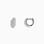 A pair of Pave Classica 14k White Gold Diamond Huggie Earrings, featuring rows of sparkling white diamonds, is displayed on a plain white background.