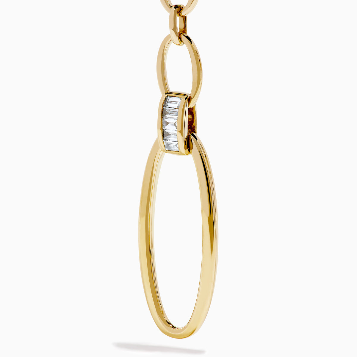 The D'Oro 14K Yellow Gold Diamond Dangle Earrings feature three oval links, a rectangular clear stone near the bottom, and a large open oval hoop, all displayed on a white background.