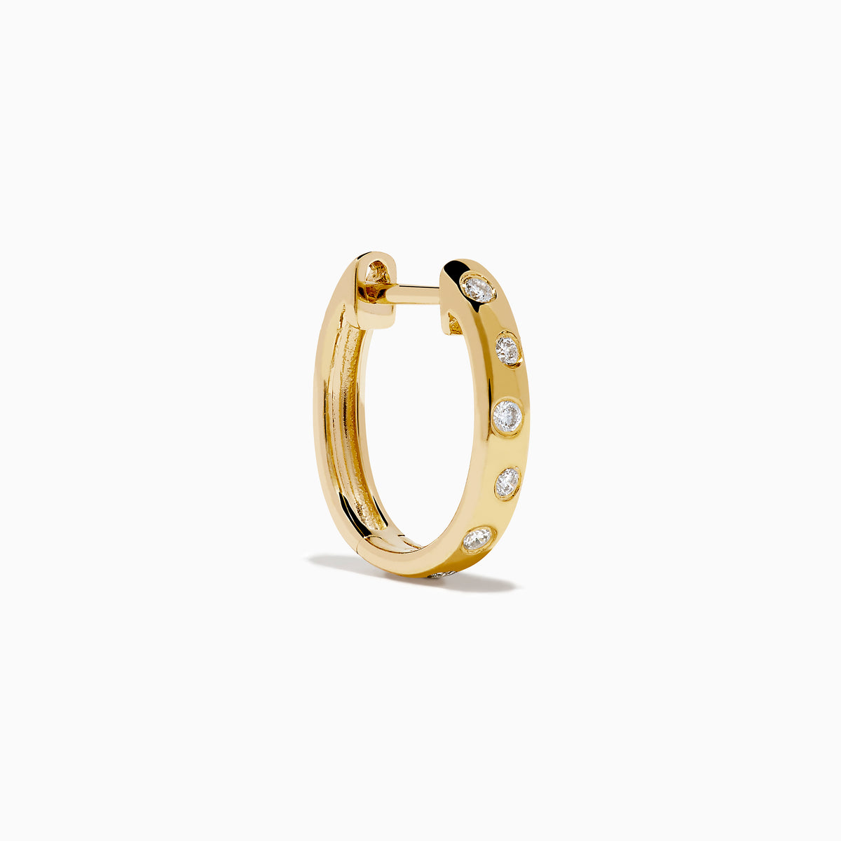 The D'Oro 14K Yellow Gold Diamond Huggie Earrings each feature three round white diamonds set vertically and are displayed against a plain white background.