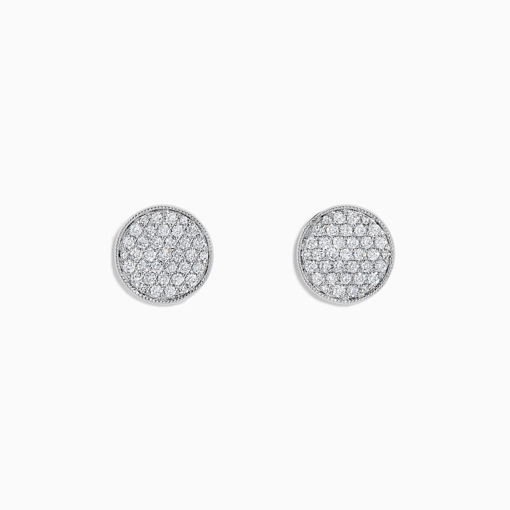 The 14K White Gold Diamond Disc Stud Earrings feature a pavé of sparkling white stones in a circular pattern, set in 14K white gold, shown against a plain white background.