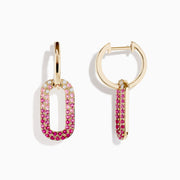 The 14K Yellow Gold Pink Sapphire and Diamond Earrings feature gold hoops with oval pendants, encrusted in a gradient of white diamonds to deep pink sapphires, crafted in 14K yellow gold and shown on a white background.