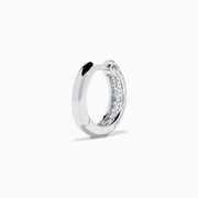 Introducing the 14K White Gold Diamond Three Row Pave Mini Hoop Earrings, featuring multiple rows of sparkling diamonds meticulously set in 14K white gold and elegantly presented against a plain white background.