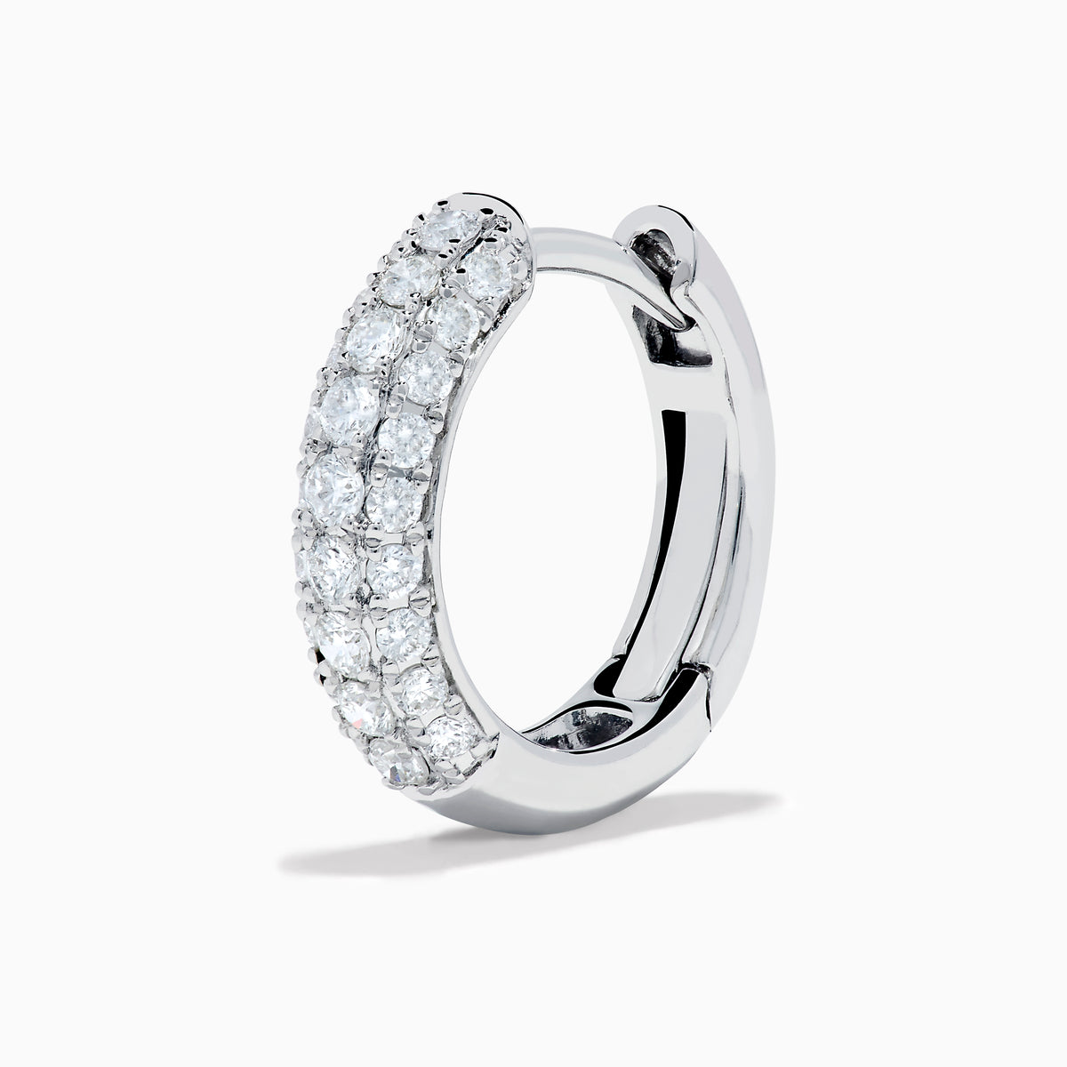 Introducing the 14K White Gold Diamond Three Row Pave Mini Hoop Earrings, featuring multiple rows of sparkling diamonds meticulously set in 14K white gold and elegantly presented against a plain white background.
