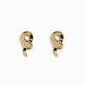 The 14K Yellow Gold Black and White Diamond Snake Earrings, featuring green gemstones, are elegantly displayed on a white background.