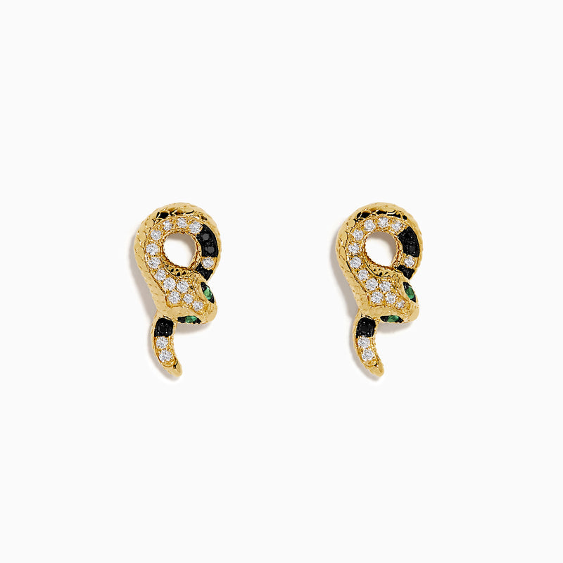 The 14K Yellow Gold Black and White Diamond Snake Earrings, featuring green gemstones, are elegantly displayed on a white background.