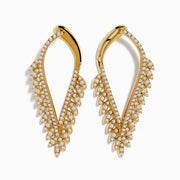 DOro 14k Yellow Gold Diamond Statement Earrings feature curved leaf shapes adorned with multiple rows of sparkling white stones in a symmetrical, elegant design.