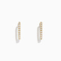 The D'Oro 14K Yellow Gold Diamond Square Huggie Earrings feature a vertical row of sparkling diamonds, beautifully set in gold and photographed on a plain white background.