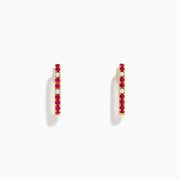 The Ruby Royale 14K Yellow Gold Ruby and Diamond Square Huggie Earrings feature slim bars set with alternating red rubies and clear diamonds, shown against a plain white background.