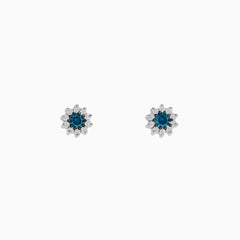 Bella Bleu 14K white gold earrings feature a floral design with blue and white diamonds (0.50 TCW) clustered at the center and clear stones surrounding, shown on a white background.