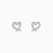 The 14K White Gold Diamond Heart Earrings feature sparkling gemstones and are shown against a white background.