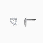 The 14K White Gold Diamond Heart Earrings feature sparkling gemstones and are shown against a white background.