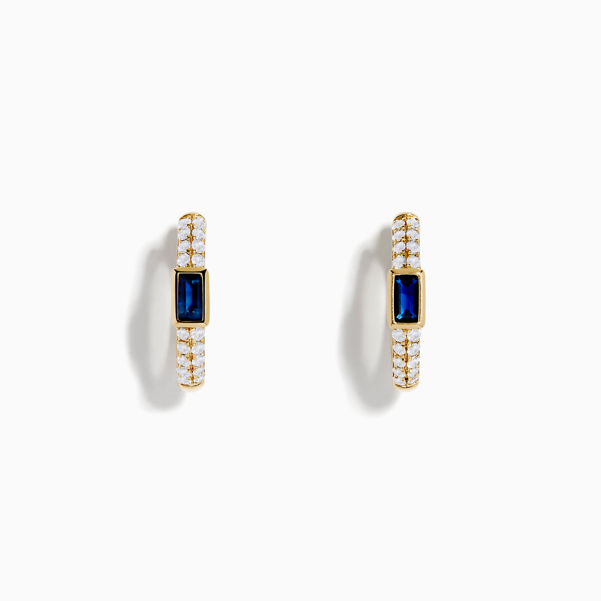 The Royal Bleu 14K Yellow Gold Sapphire and Diamond Earrings feature small clear stones and a central rectangular sapphire, shown on a white background.