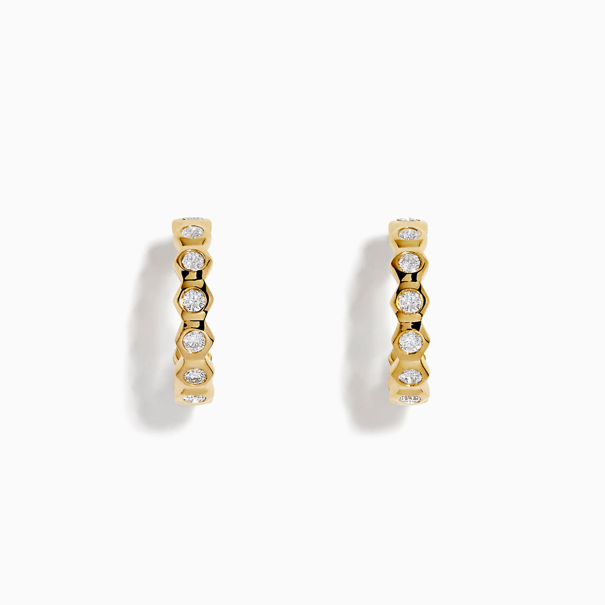 D'Oro 14K Yellow Gold Bezel Set Diamond Mini Hoop Earrings feature round diamonds in bezel settings along the front, alternating with gold, shown on a white background.