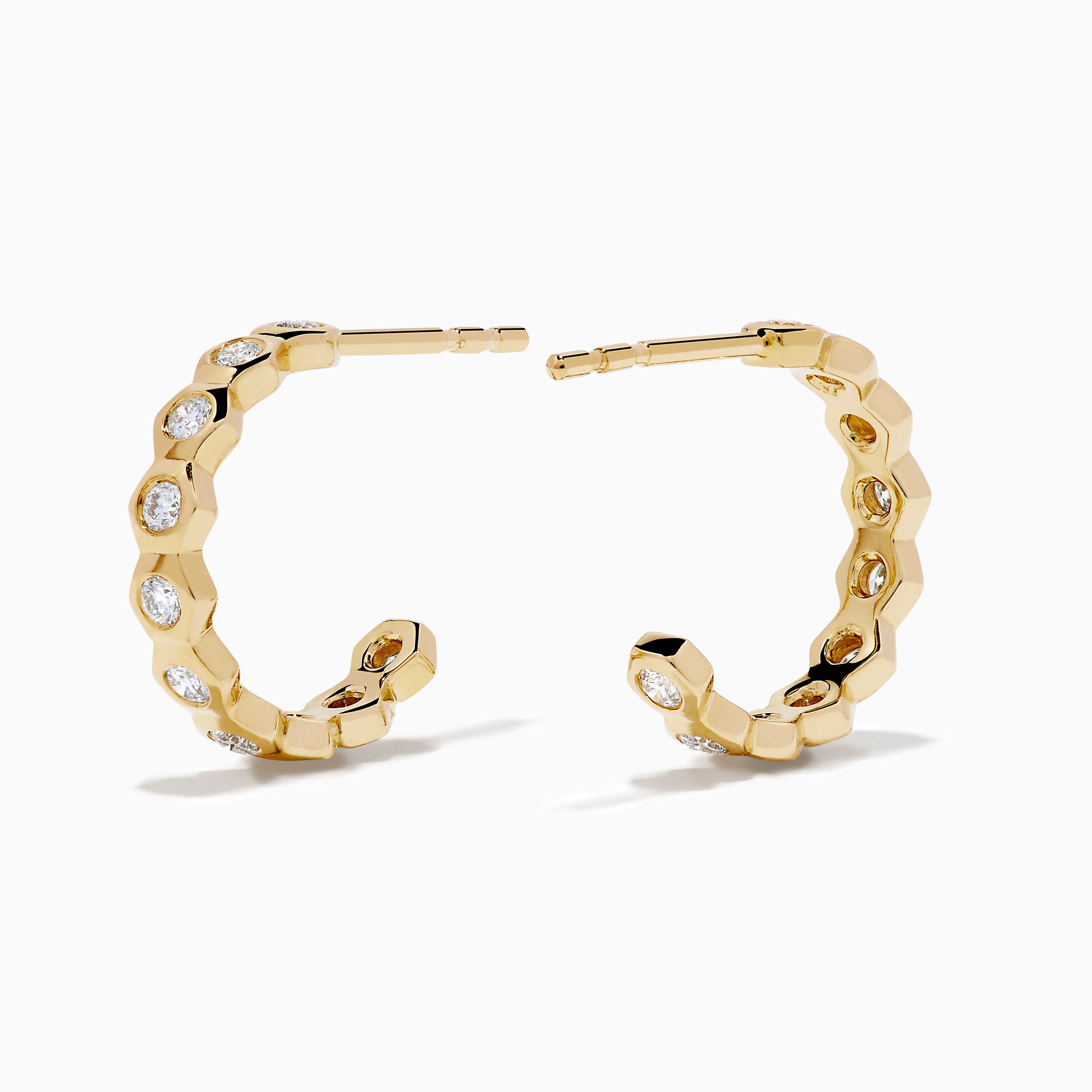 D'Oro 14K Yellow Gold Bezel Set Diamond Mini Hoop Earrings feature round diamonds in bezel settings along the front, alternating with gold, shown on a white background.