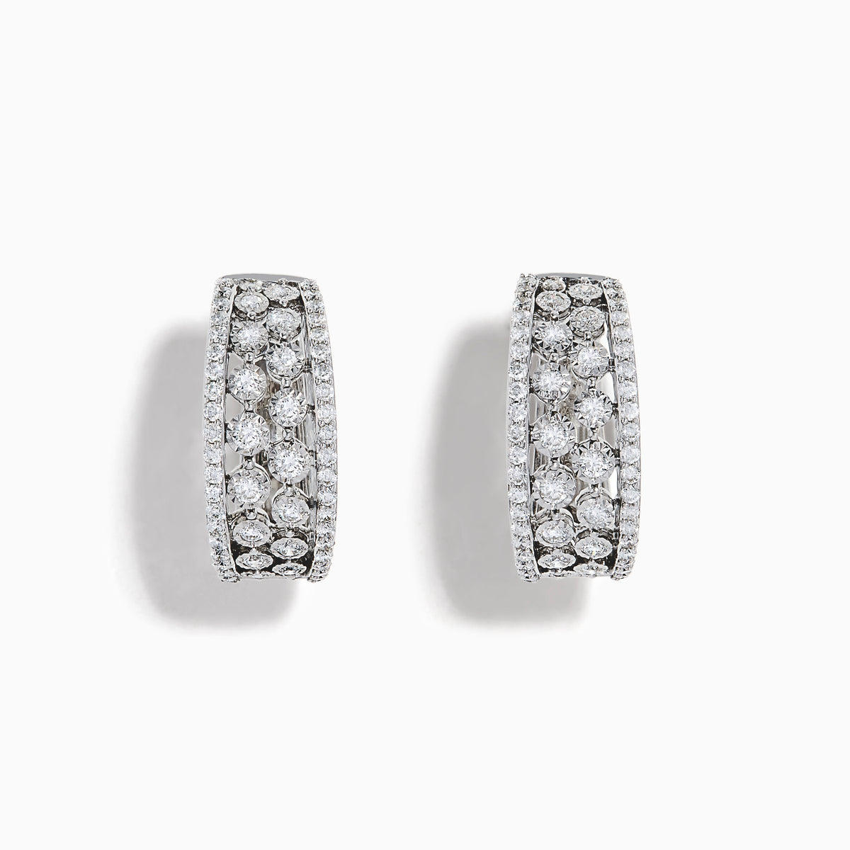 Discover the 14K White Gold Diamond Miracle Setting Pave Hoop Earrings, designed with three rows of round clear diamonds in a stunning miracle setting, beautifully crafted in white gold and showcased on a plain white background.