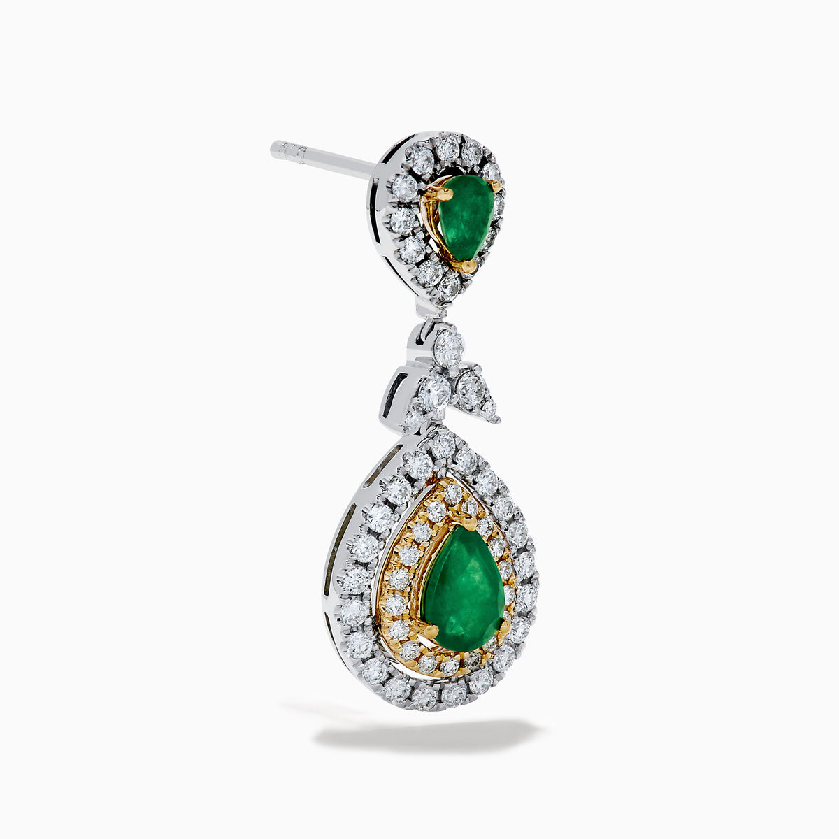Chic 14K two tone gold statement earrings featuring double pear emeralds, concentric rows of white and yellow diamonds, and a delicate diamond bow—elegant emerald and diamond earrings for any occasion.