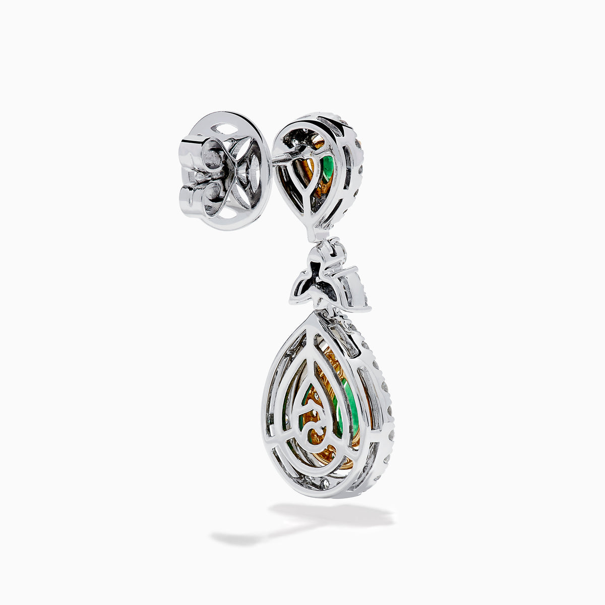 Chic 14K two tone gold statement earrings featuring double pear emeralds, concentric rows of white and yellow diamonds, and a delicate diamond bow—elegant emerald and diamond earrings for any occasion.