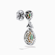 Chic 14K two tone gold statement earrings featuring double pear emeralds, concentric rows of white and yellow diamonds, and a delicate diamond bow—elegant emerald and diamond earrings for any occasion.