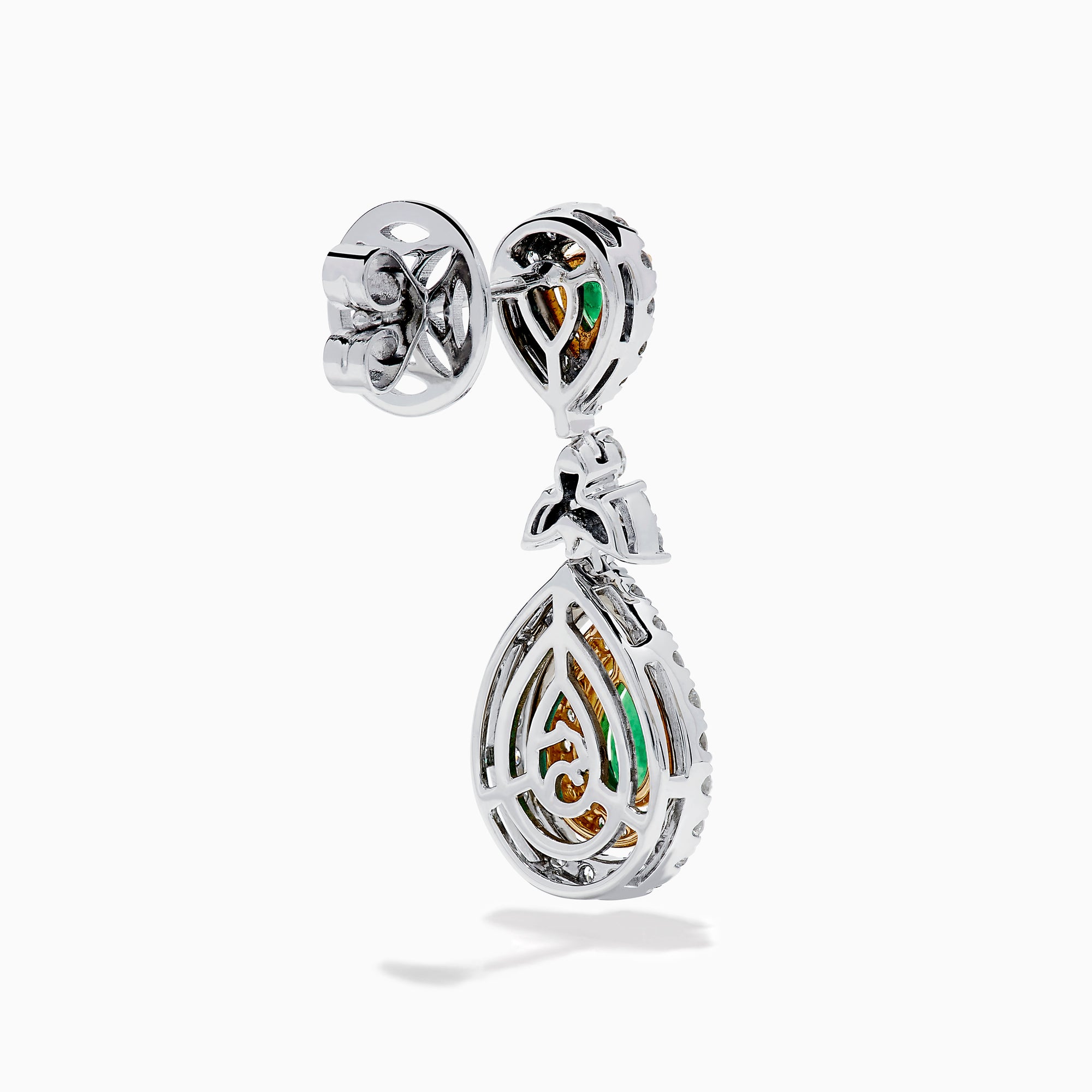 Chic 14K two tone gold statement earrings featuring double pear emeralds, concentric rows of white and yellow diamonds, and a delicate diamond bow—elegant emerald and diamond earrings for any occasion.