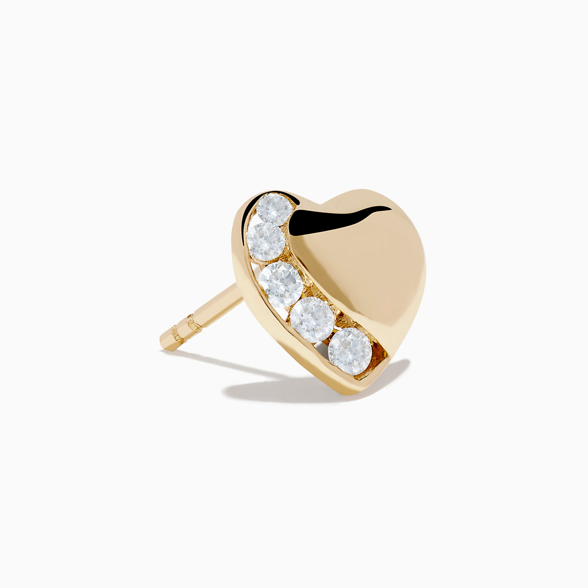 The DOro 14K Yellow Gold Diamond Heart Stud Earrings feature a curved row of small, round white diamonds on one side, shown on a plain white background.