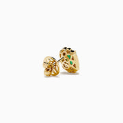 The 14K Yellow Gold Emerald and Diamond Halo Stud Earrings showcase rectangular green gemstones encircled by round and baguette-cut diamonds, displayed on a plain white background.