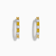 Canare 18K Two Tone White and Yellow Diamond Hoop Earrings, featuring alternating round yellow and white diamonds, are displayed against a white background.