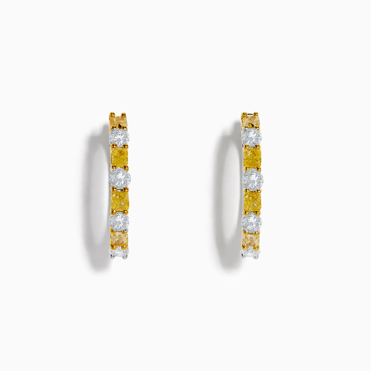 Canare 18K Two Tone White and Yellow Diamond Hoop Earrings, featuring alternating round yellow and white diamonds, are displayed against a white background.