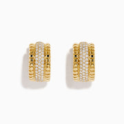 The D'Oro 14K Yellow Gold Pave Diamond Chunky Huggie Earrings feature three rows of sparkling white diamonds set in the center and bordered by polished gold segments.
