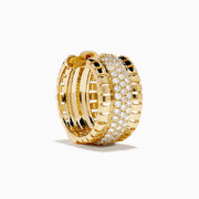 The D'Oro 14K Yellow Gold Pave Diamond Chunky Huggie Earrings feature three rows of sparkling white diamonds set in the center and bordered by polished gold segments.