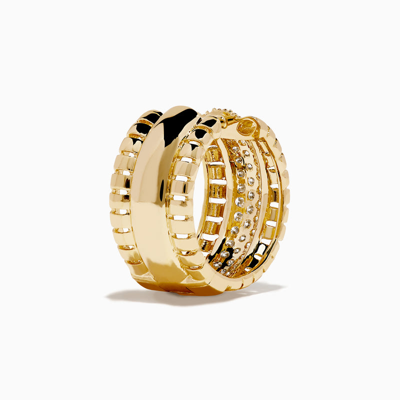 The D'Oro 14K Yellow Gold Pave Diamond Chunky Huggie Earrings feature three rows of sparkling white diamonds set in the center and bordered by polished gold segments.