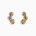 The Watercolors 14K Yellow Gold Multi Sapphire and Tsavorite Floral Ear Climber Stud Earrings feature colorful gemstone clusters in a vibrant floral design, showcased against a white background.