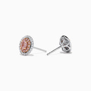 18K Two Tone Gold Pink and White Diamond Halo Stud Earrings feature a central pink stone encircled by a halo of sparkling white diamonds in an elegant circular design.