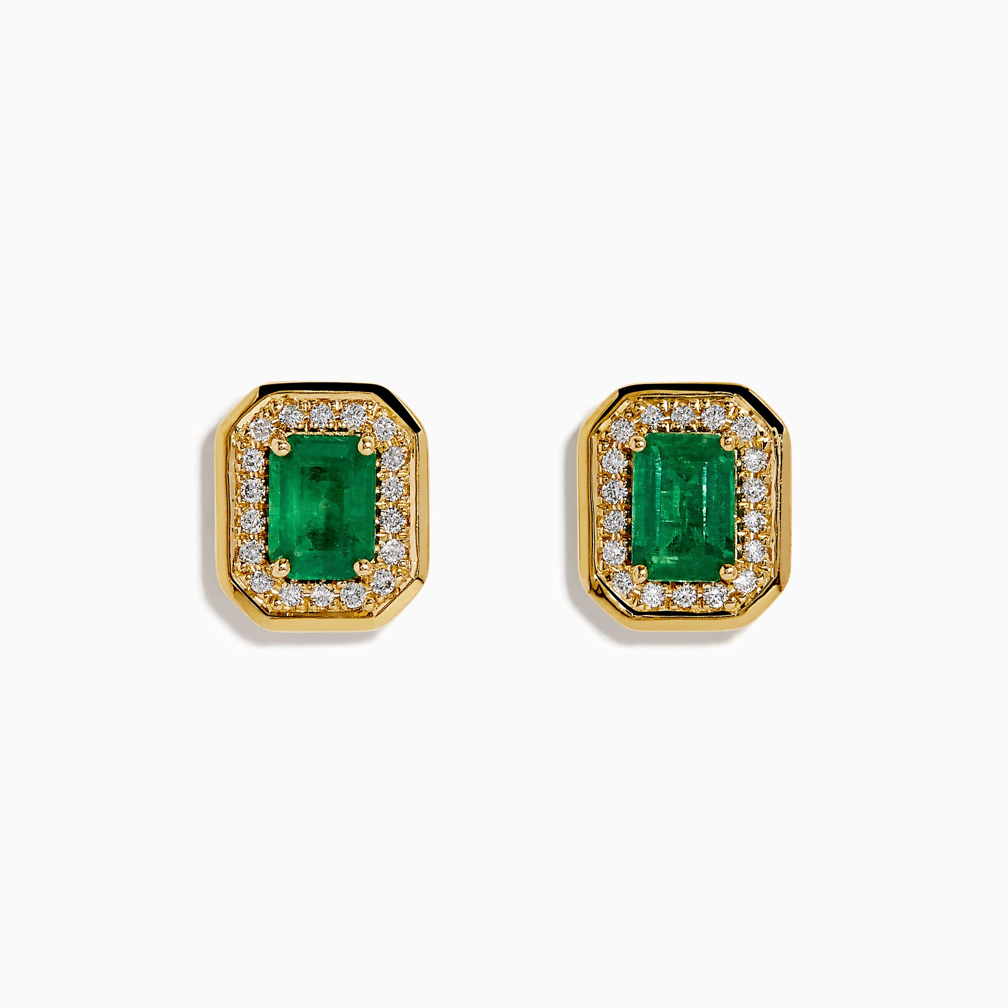The 14K Yellow Gold Emerald and Diamond Halo Stud Earrings feature rectangular emerald-green stones surrounded by a sparkling diamond halo, set in yellow gold and shown against a white background.