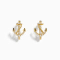 14K Yellow Gold Diamond Anchor Hoop Earrings, featuring sparkling clear stones in an anchor shape, displayed on a plain white background.