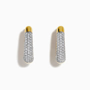 The 14K Yellow Gold Diamond Pave Huggie Hoop Earrings feature a tapered design with sparkling diamonds encrusted on the front, shown against a white background.