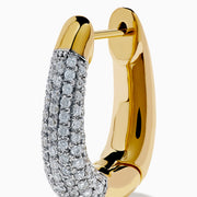 The 14K Yellow Gold Diamond Pave Huggie Hoop Earrings feature a tapered design with sparkling diamonds encrusted on the front, shown against a white background.