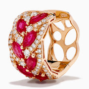 The 14K Rose Gold Marquise Ruby and Diamond Leaf Earrings feature marquise-shaped rubies and sparkling diamonds in an elegant leaf pattern, beautifully displayed on a plain white background.