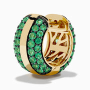 The 14K Yellow Gold Emerald Pave Huggie Earrings feature a central gold stripe flanked by pavé-set green gemstones, perfect as emerald huggies and displayed against a white background.